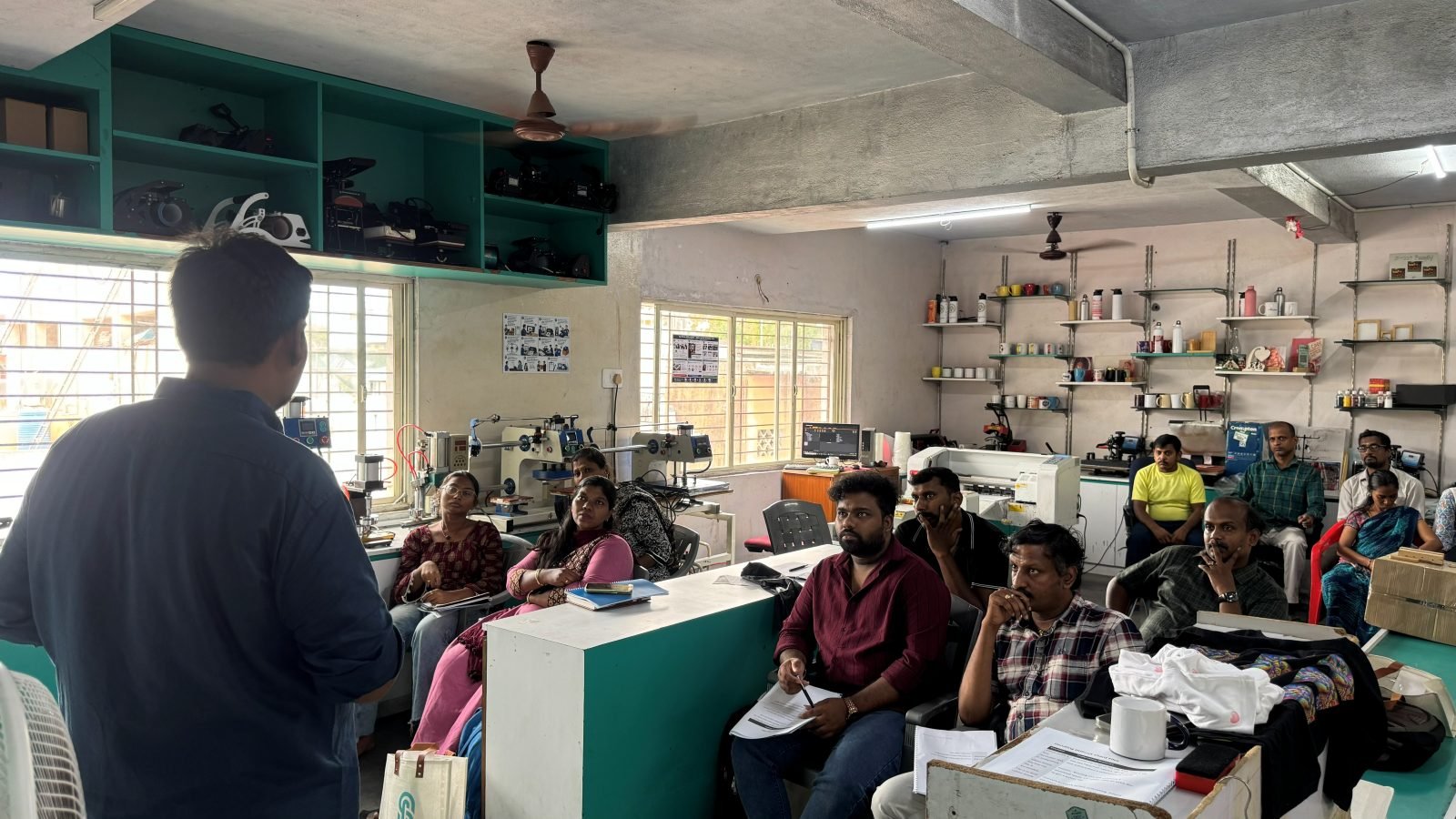 Participants learning printing business skills at the Founder's Workshop in Nungambakkam